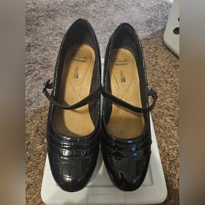 Black quilted patten leather